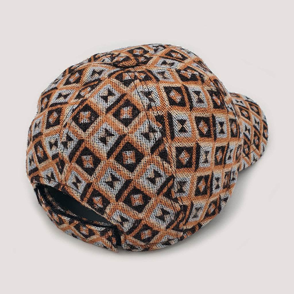 Gorra lana estampada en naranja y gris